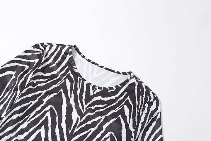 Neia studio top à rayures avec lacets pour femmes, tenue tendance et élégante.