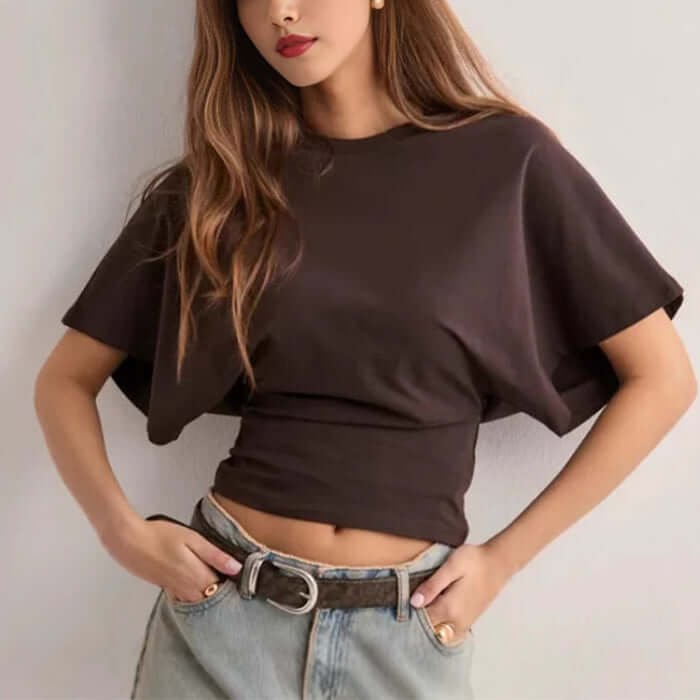 T-shirt à manches chauve-souris Neia studio, disponible en plusieurs couleurs, style décontracté et confortable.