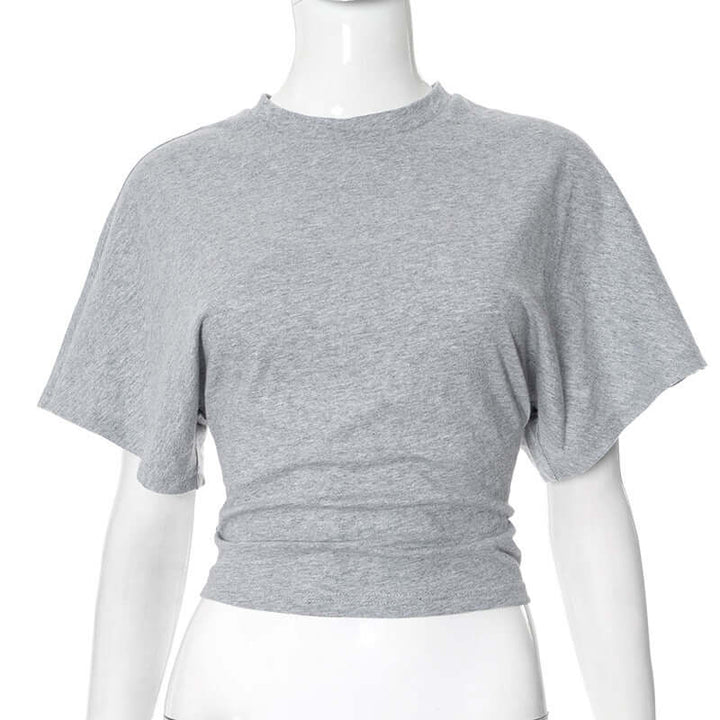 T-shirt à manches chauve-souris Neia studio, disponible en plusieurs couleurs, style décontracté et confortable.