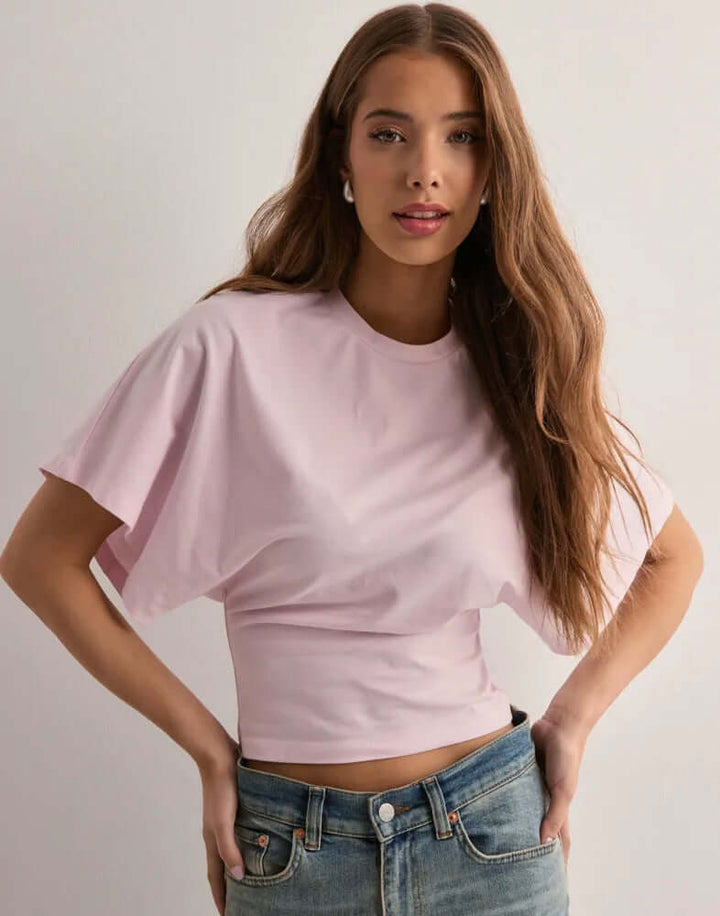 T-shirt à manches chauve-souris Neia studio, disponible en plusieurs couleurs, style décontracté et confortable.