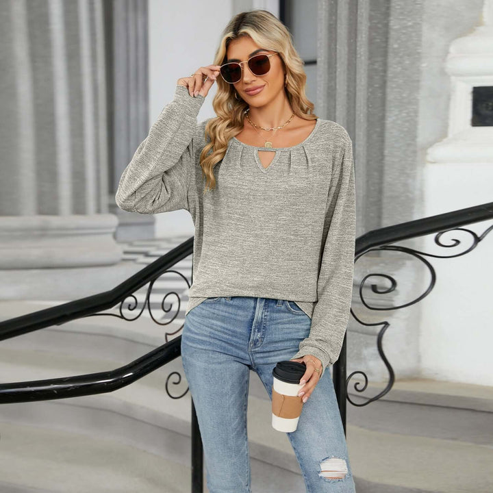 Neia studio T-shirt à manches longues amples de couleur unie, parfaite pour un look décontracté et tendance.