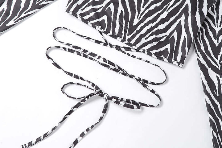 Neia studio top à rayures avec lacets pour femmes, tenue tendance et élégante.