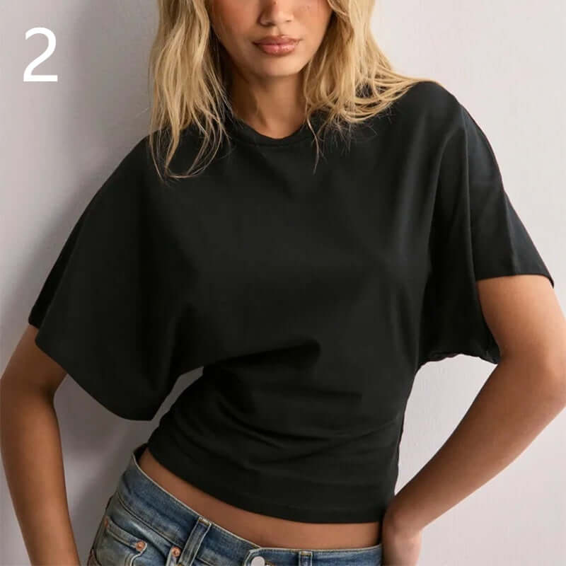 T-shirt à manches chauve-souris Neia studio, disponible en plusieurs couleurs, style décontracté et confortable.
